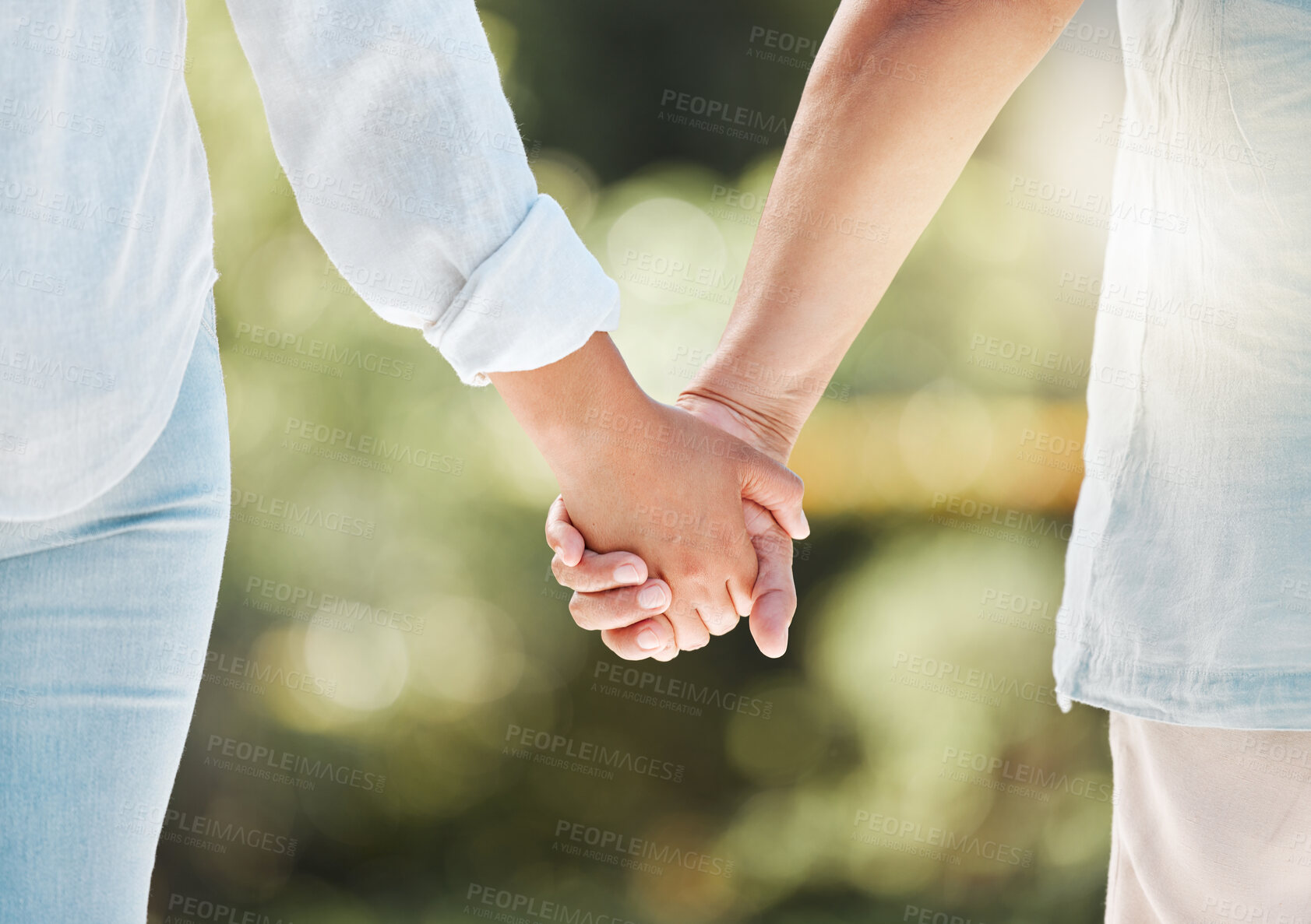 Buy stock photo Love, support and holding hands with couple in nature for respect, gratitude and happiness. Community, trust and faith with closeup of people in garden for partnership, solidarity or romance together