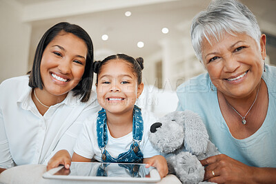 Buy stock photo Portrait of a mature woman boding with her daughter and granddaughter on the sofa at home