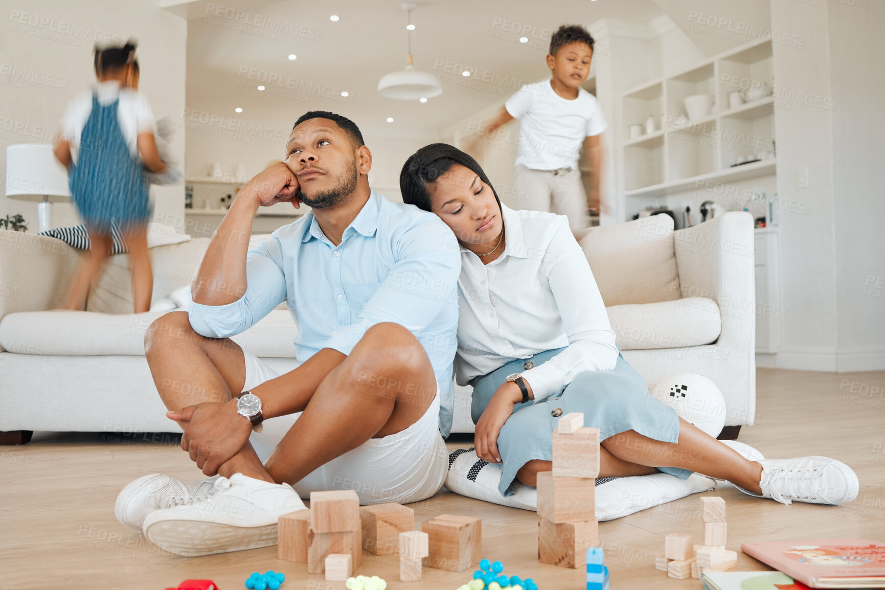 Buy stock photo Burnout, running and parents with stress, kids and tired with chaos, anxiety and noise in home living room. Mother, father and energetic children in lounge with adhd, fatigue and motion with headache