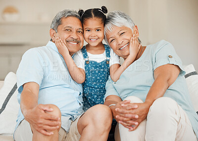 Buy stock photo Love, portrait of grandparents with child smile and on a sofa in living room of their home. Support or care, generations and elderly people with grandchild on smiling couch for bonding time together