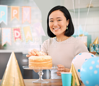 Buy stock photo Shot of an young woman celebrating a birthday at home