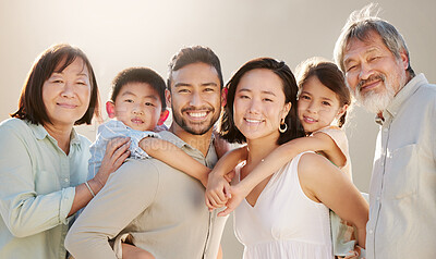 Buy stock photo Cropped shot of a happy diverse multi-generational family at the beach
