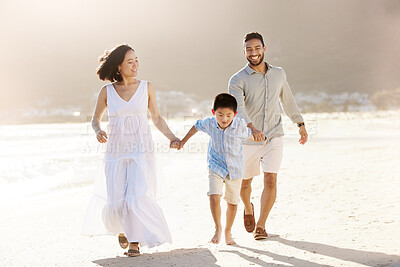Buy stock photo Full length shot of a happy diverse family of three at the beach