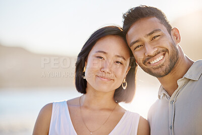Buy stock photo Cropped portrait of an affectionate diverse couple on the beach