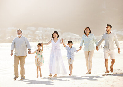 Buy stock photo Full length shot of a happy diverse multi-generational family at the beach