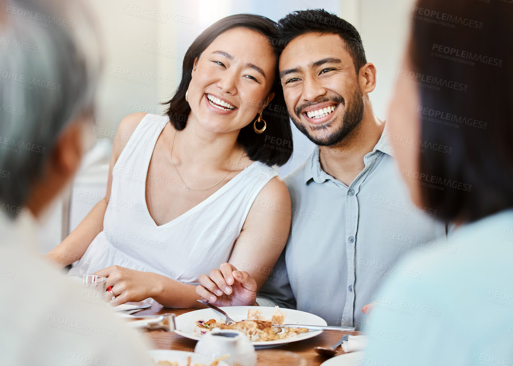 Buy stock photo Family, couple and smile in dining room with food, thanksgiving lunch or reunion for bonding together. Happy, Asian people and senior parents in home with care, marriage or meal for healthy nutrition
