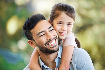 Buy stock photo Shot of an adorable little girl and her father having a fun day at the park