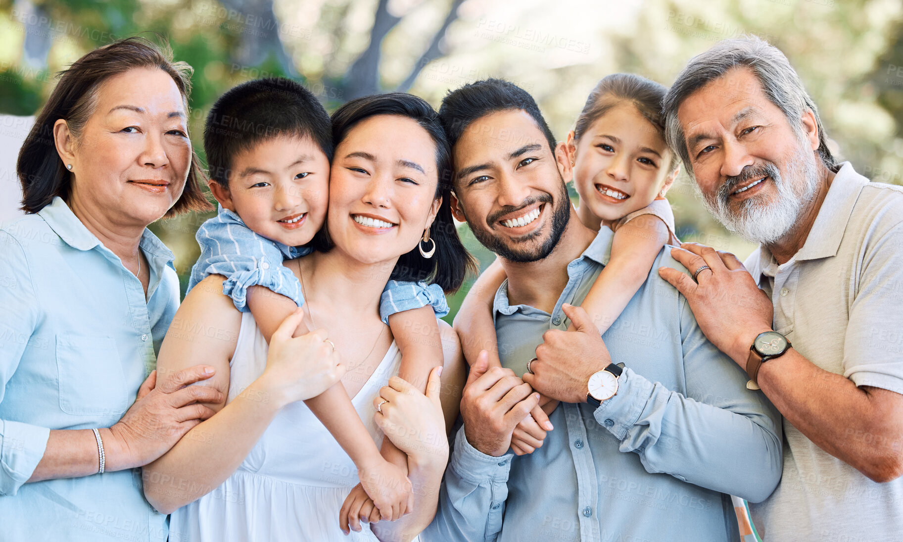 Buy stock photo Outdoor, generations or big family with piggyback for portrait, connection or bonding for relationship. Asian people, grandparents or parents with kids for support, weekend fun or love for happiness