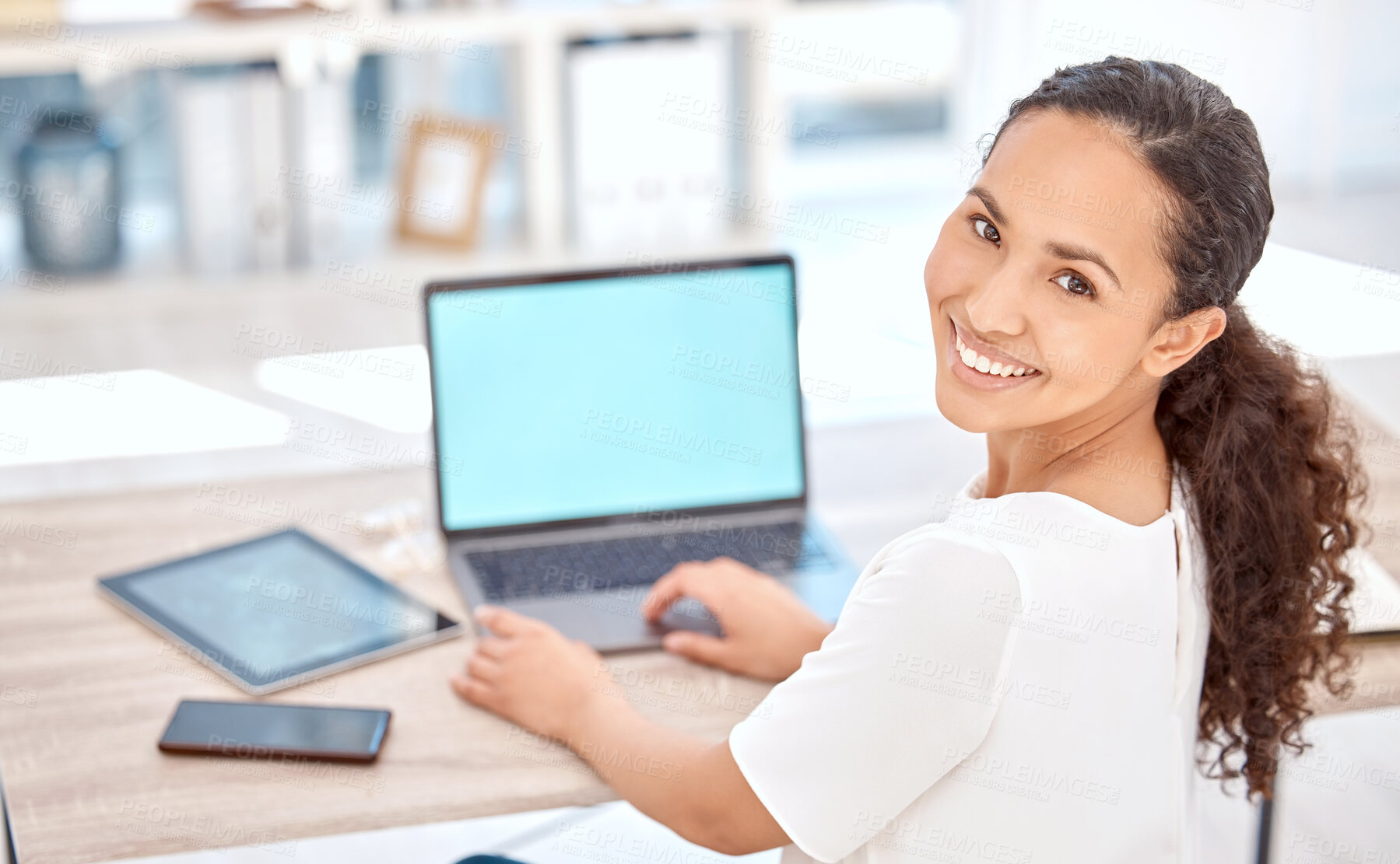 Buy stock photo Happy, businesswoman and laptop with mockup, blank screen and chroma key display for research in office. Smile, female person and technology for ideas and planning company proposal in boardroom