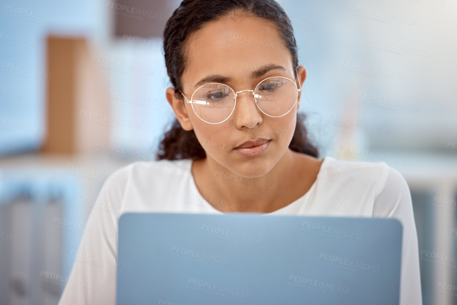 Buy stock photo Face, laptop and problem solving with remote work woman in home office for information or research. Glasses, reading and research with freelance employee in apartment for small business startup