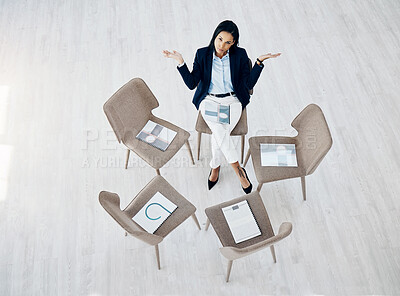 Buy stock photo Portrait, empty and waiting for a meeting with a business woman sitting on a chair in a corporate office from above. Why, question and late with an impatient female employee alone in the workplace