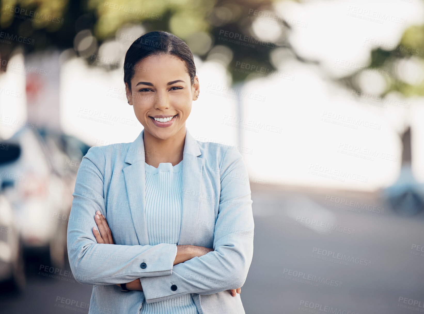 Buy stock photo Business woman, arms crossed and portrait in a city with a smile from worker success. Young female person, professional and urban commute with travel and happy employee on a street with bokeh