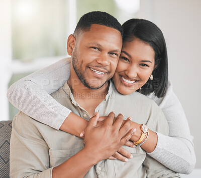 Buy stock photo Portrait of a young couple relaxing at home