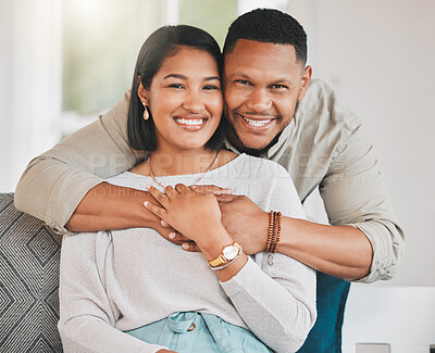 Buy stock photo Portrait of a young couple relaxing at home