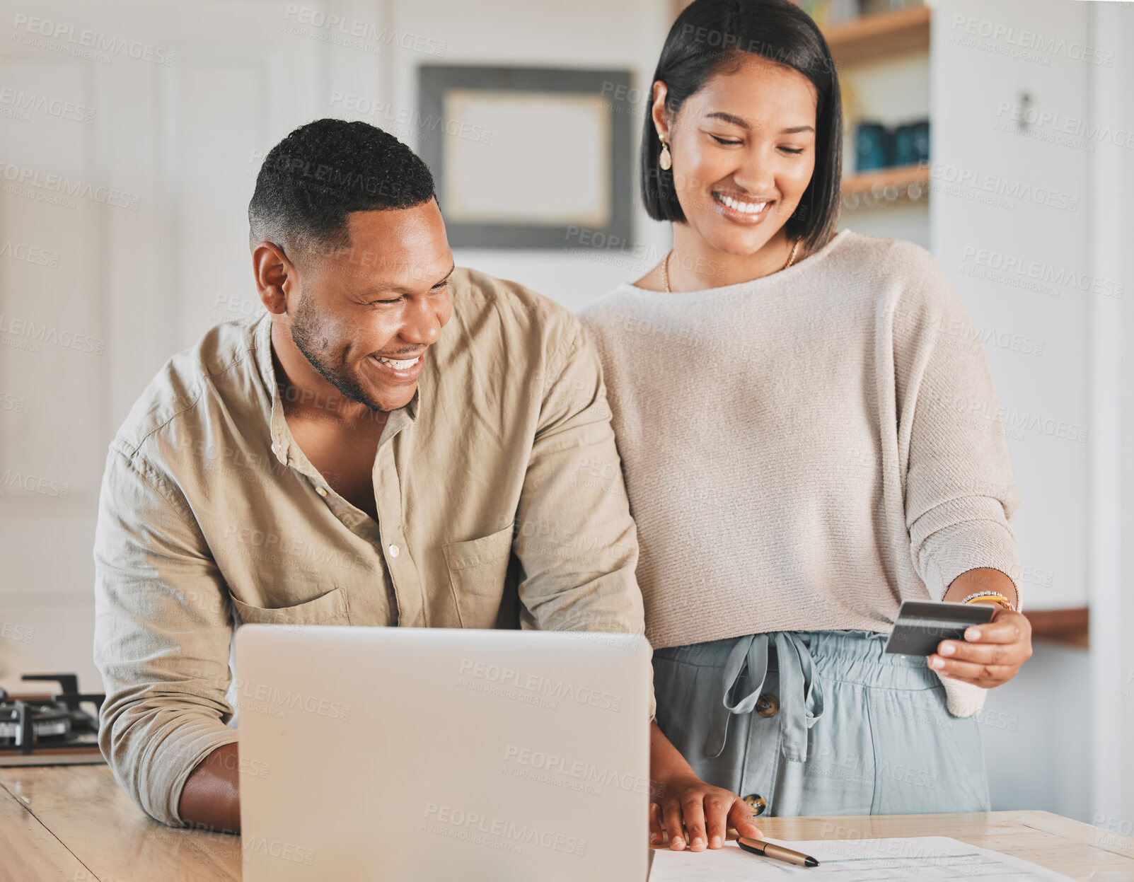 Buy stock photo Happy couple, laptop and online banking with credit card for payment, purchase or ecommerce at home. Man and woman with smile or debit on computer for online shopping, fintech or finance at house