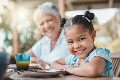 Buy stock photo Portrait, lunch and grandmother with girl, smile and happiness with nutrition, relax and social gathering. Face, family and granny with kid, calm and comfort with joy, cheerful and childhood