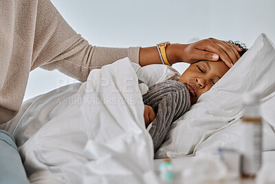 Buy stock photo Sick, child and hand with fever in bedroom for flu infection, illness and sleeping with blankets. Tired, kid and mother with care at home for temperature, healthcare and monitoring of symptoms