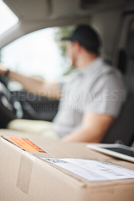 Buy stock photo Cropped shot of an unrecognizable male courier out making deliveries using his van