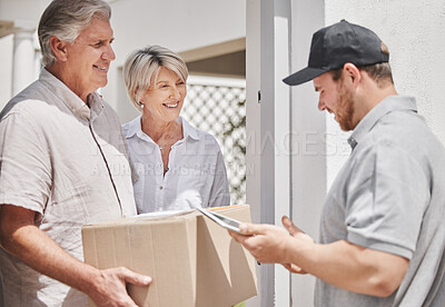 Buy stock photo Cropped shot of a handsome young male courier delivering a package to a senior couple at their home