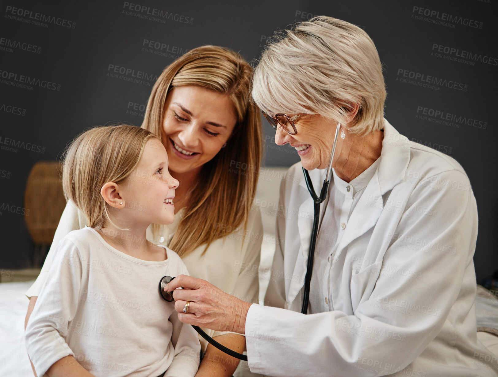 Buy stock photo Mother, child and doctor with stethoscope in home for medical checkup, appointment and heart health. Woman, girl kid and pediatrician listening to heartbeat in bedroom for lung test and examination