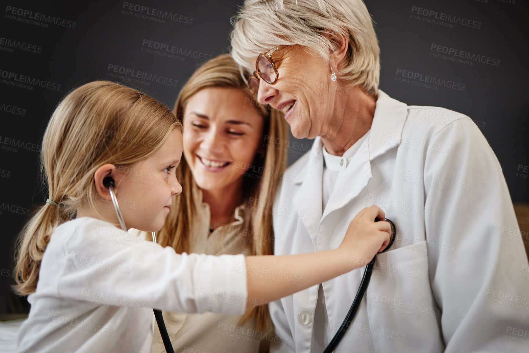 Buy stock photo Happy mother, checkup and child with stethoscope for playing doctor, nurse or exam at home. Mom, pediatrician or little girl with healthcare tools for checking heart beat, pulse or breathing at house