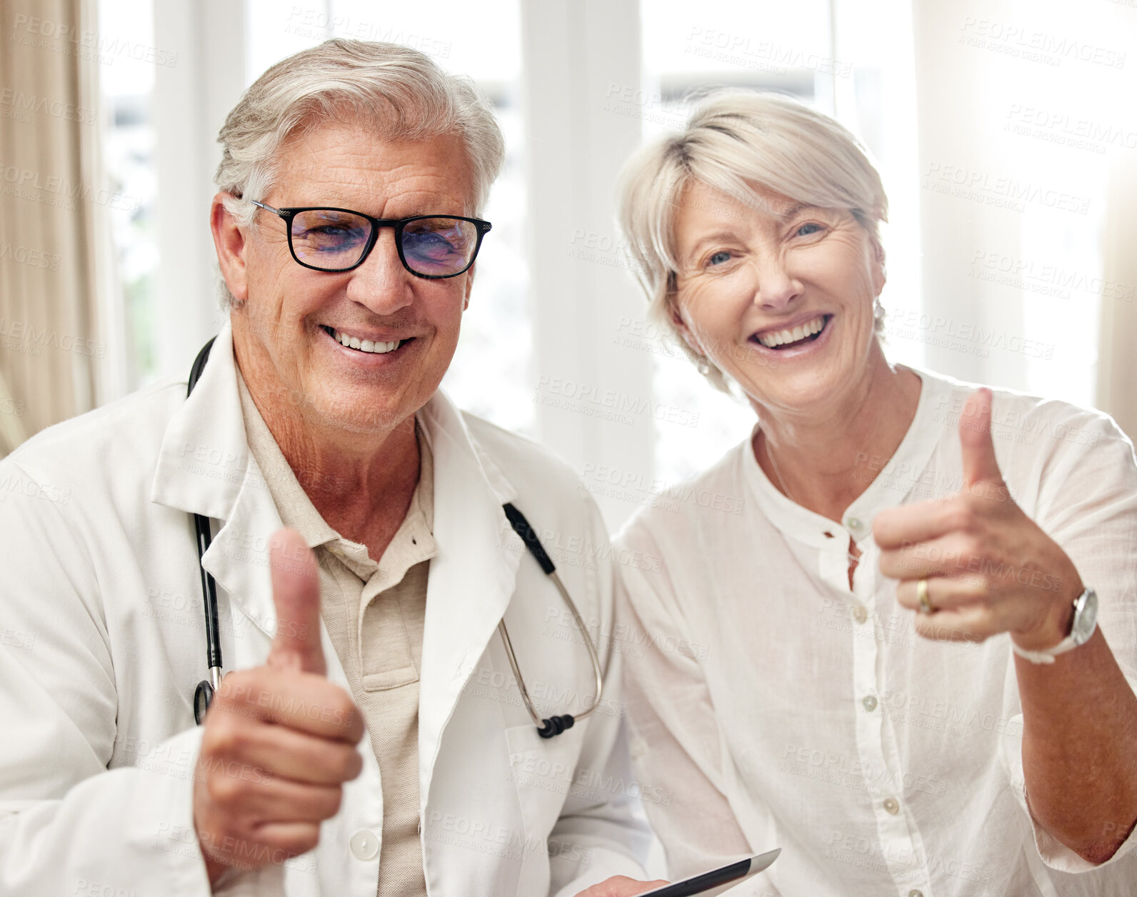 Buy stock photo Man, portrait and doctor with patient or thumbs up for checkup, visit or healthcare feedback at home. Mature male person, medical professional or client with smile, like emoji or yes sign for review