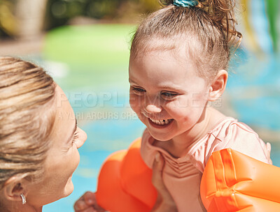 Buy stock photo Girl toddler, learning or swimming instructor in pool for lesson, education or practice in summer. Woman, outdoor or teacher in water for exercise or development for happy child or kid in Australia