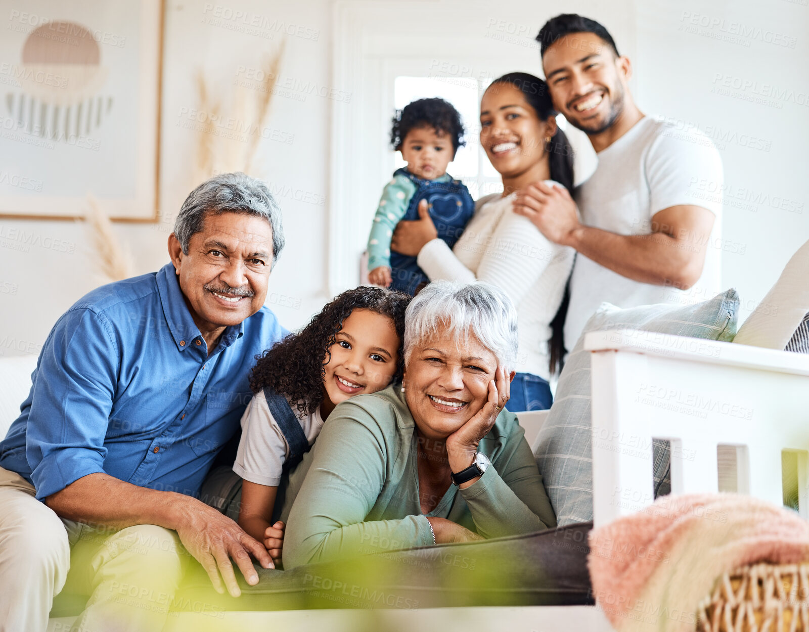 Buy stock photo Shot of a family spending time together at home