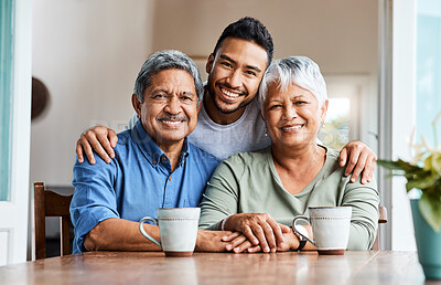 Buy stock photo Shot of a young son spending time with his parents at home
