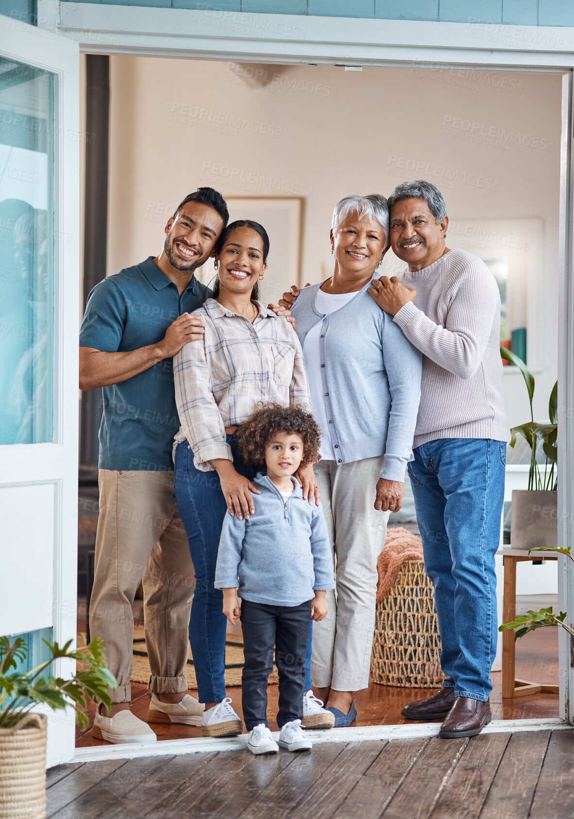 Buy stock photo Shot of a family spending time together at home