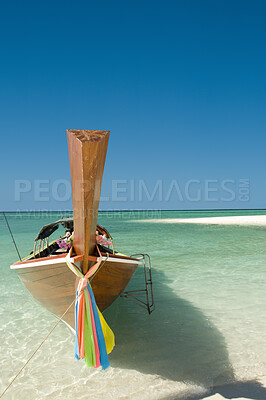 Buy stock photo Sea, blue sky and horizon on beach with boat on shore, travel and tourism with holiday destination landscape. Transport, vessel and tropical island for adventure, nature outdoor and trip to Thailand