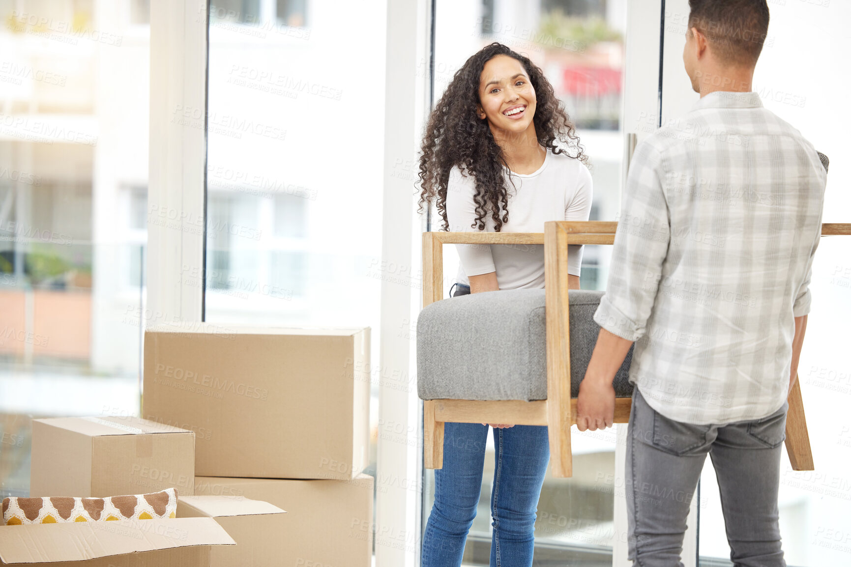 Buy stock photo Happy, people and couple with furniture in new home for moving, teamwork and remodeling of living room. Smile, woman and man with sofa by cardboard box for house renovation, partnership and support