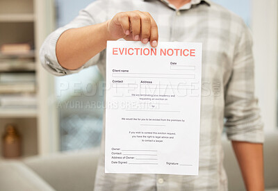 Buy stock photo Shot of an unrecognizable man holding an eviction notice
