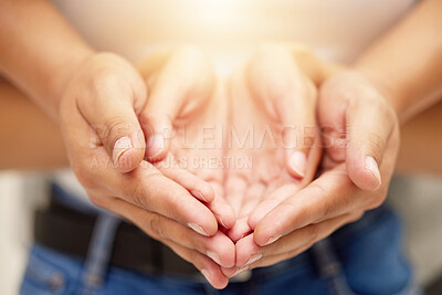 Buy stock photo Shot of an unrecognizable couple holding hands