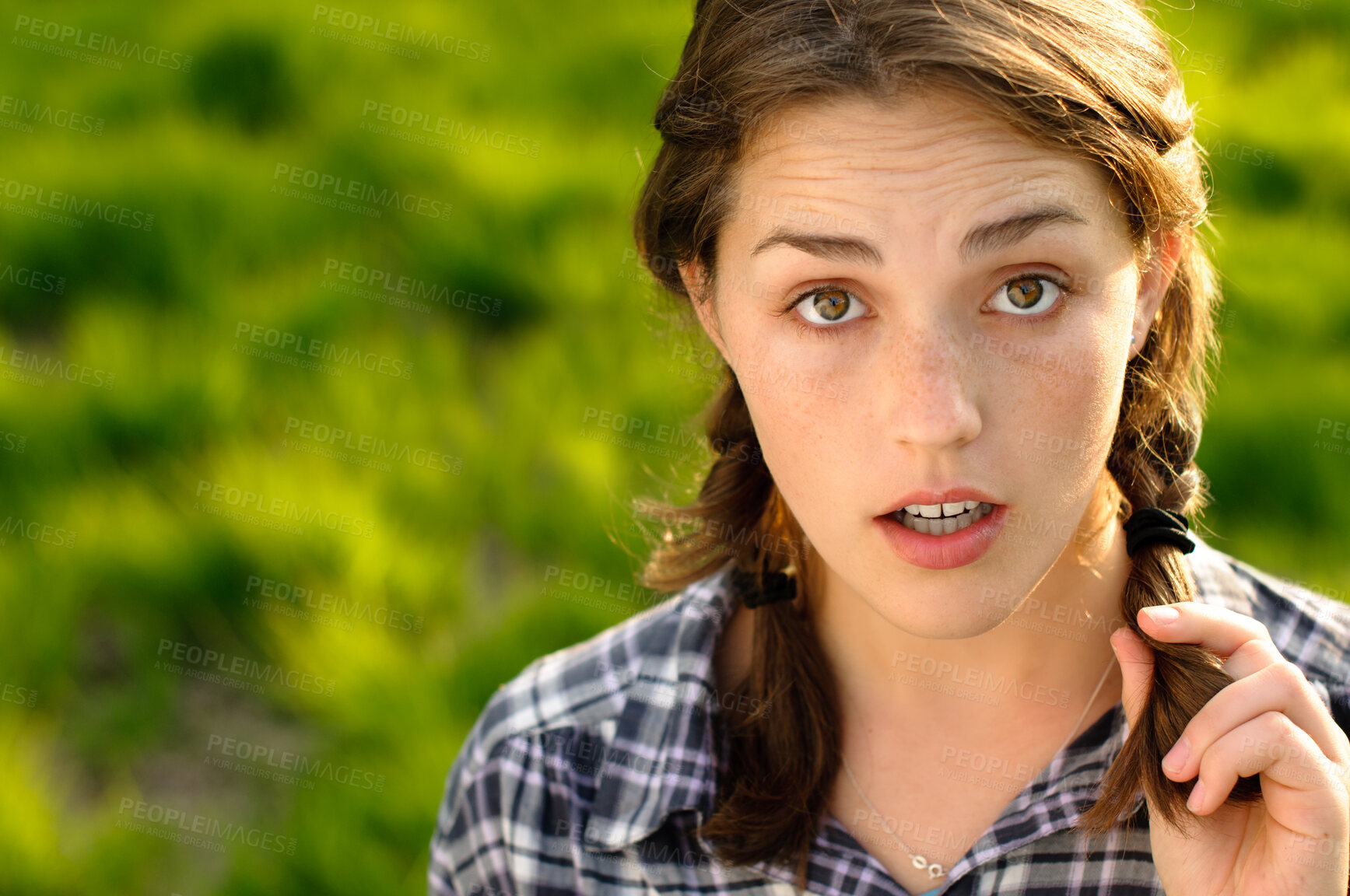 Buy stock photo Face, woman and student with confused at park for university break, relax and chill in summer holiday. Female person, portrait and forest for nature, vacation and day off on college from above