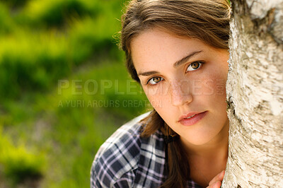 Buy stock photo Face, woman and portrait with leaning on tree at at park for  university break, relax and summer holiday. Female person, above and garden or forest for nature, vacation and day off on college