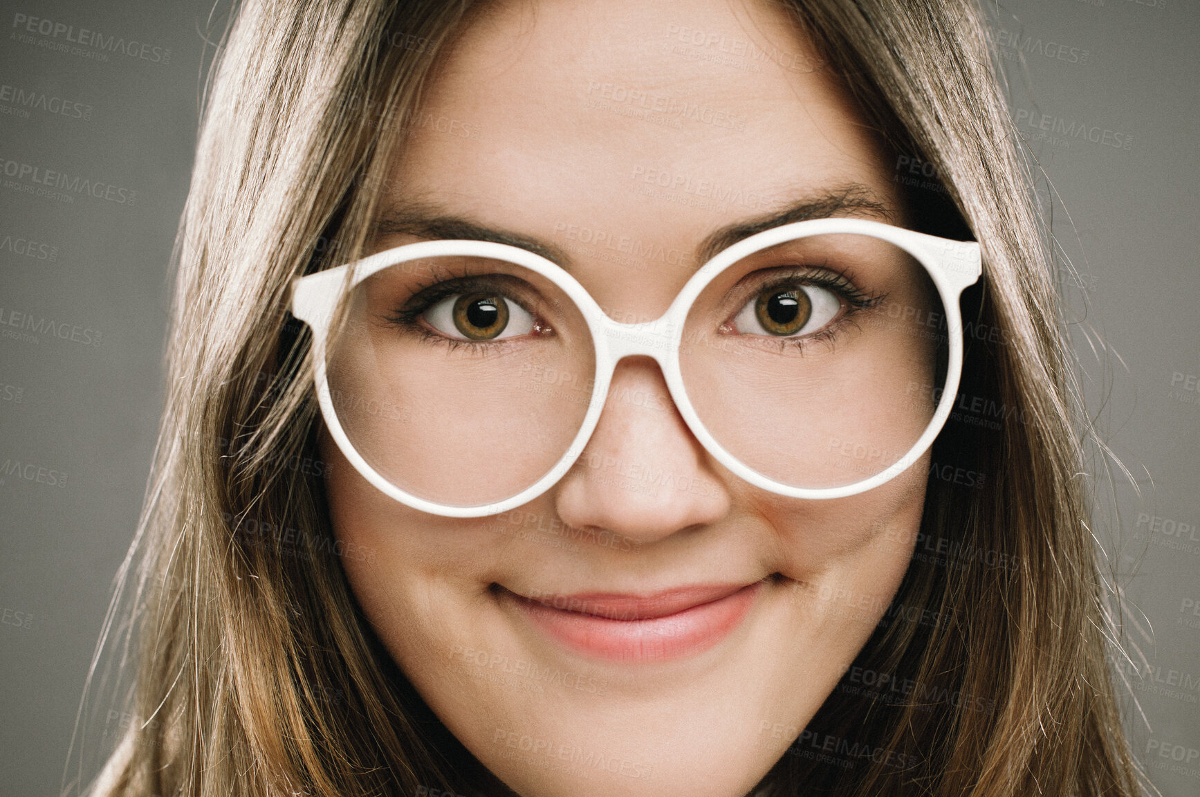 Buy stock photo Glasses, portrait and smile with girl nerd in studio on gray background for accessories or fashion. Face, intelligence and vision with cute, happy geek closeup in eyewear for retro or vintage style