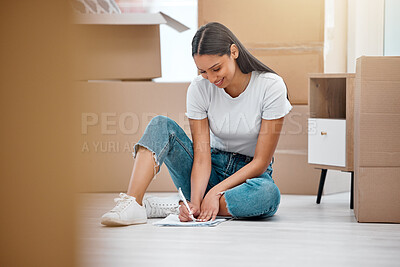 Buy stock photo Woman, paperwork and new home with moving boxes for loan agreement or real estate, investment or property. Female person, smile and document signature for finance approval, mortgage or immigration