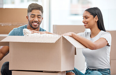 Buy stock photo Couple, moving boxes and new home or real estate investment or property, milestone or future. Man, woman and happy in apartment unpacking as owner with mortgage for immigration, finance or relocation