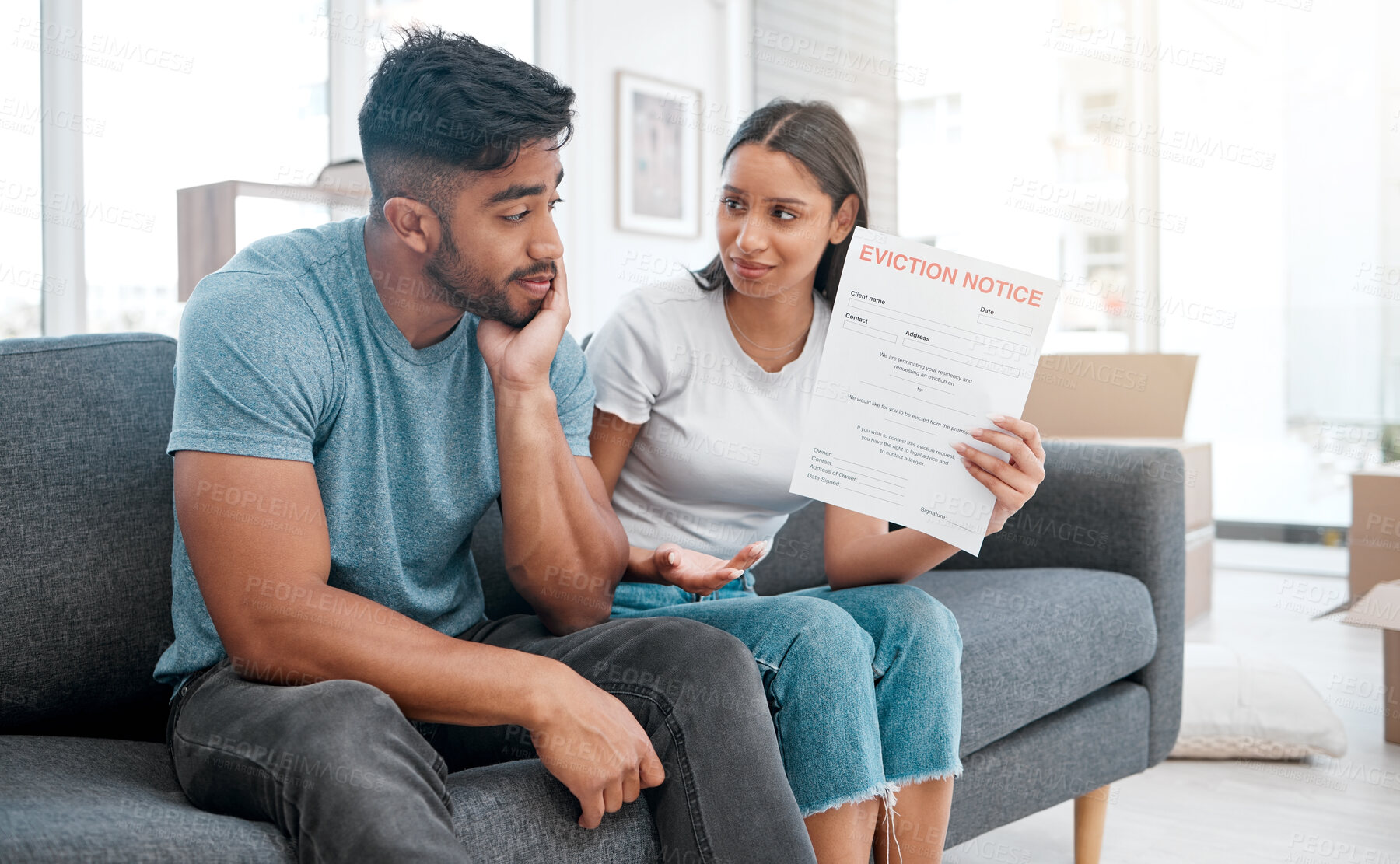 Buy stock photo Frustrated couple, eviction and documents with stress for financial crisis, billing or rent on home sofa. Man and woman in concern, discussion or anxiety with paperwork for mortgage payment or notice