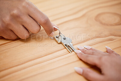 Buy stock photo Shot of an unrecognisable man taking a set of house keys from his rental agent