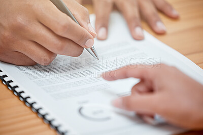 Buy stock photo Shot of an unrecognisable man sitting with his rental agent and signing a lease agreement