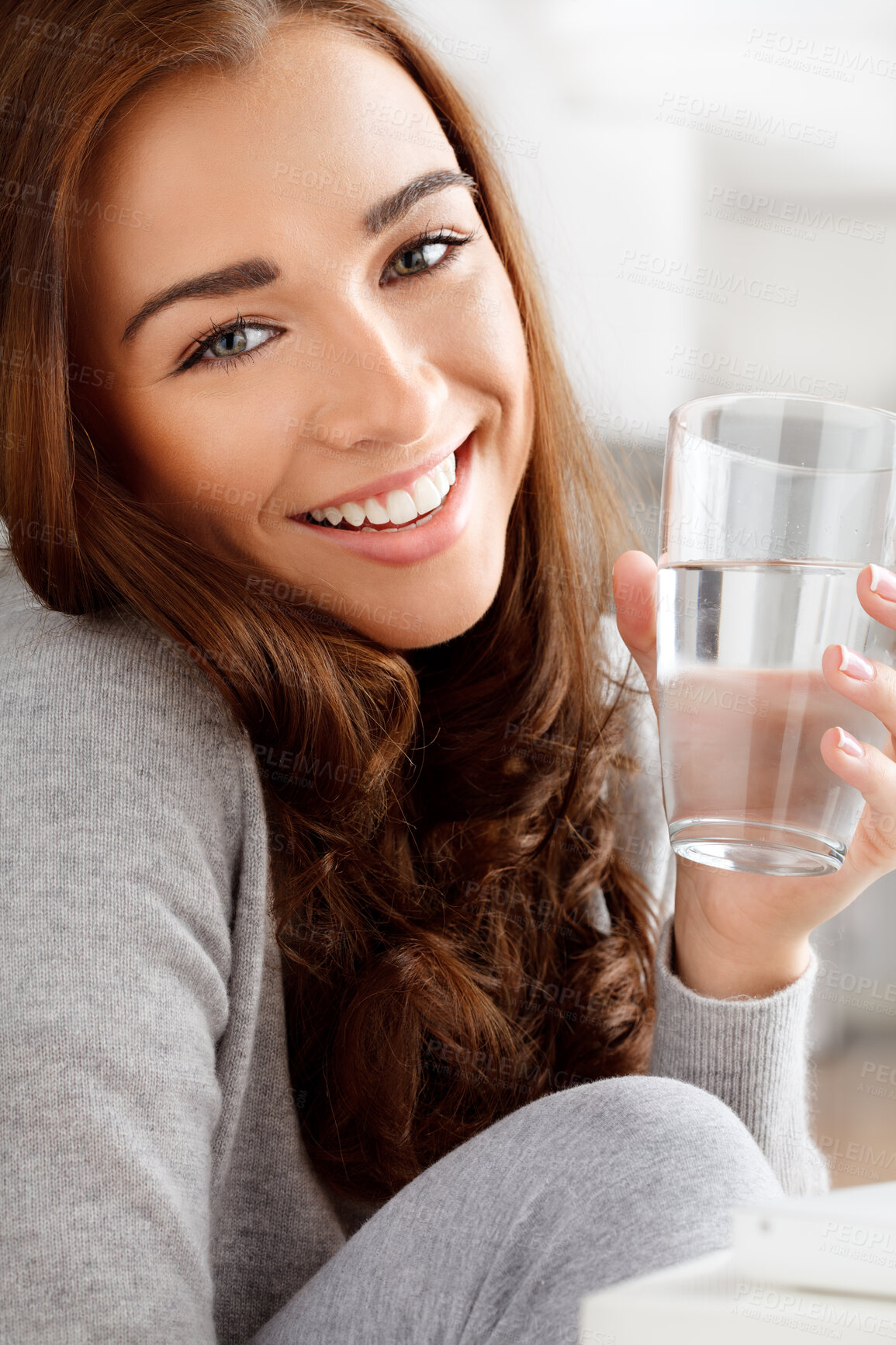 Buy stock photo Wellness, hydration and water with young woman living a balance diet lifestyle, drinking refreshing drink at home. Portrait of thirsty female on natural cleanse, enjoying health and mineral benefits 