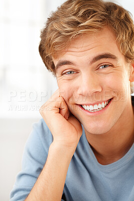 Buy stock photo Shot of a young man relaxing at home