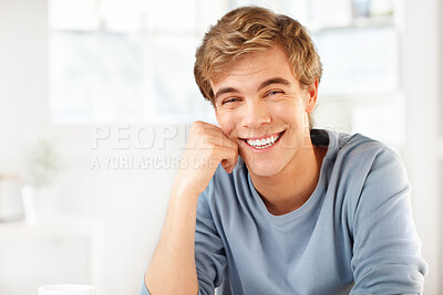 Buy stock photo Portrait, relax and smile of man, house and peace for weekend, break and mockup space and happy. Holiday, university student and guy in apartment, morning and Gen z in home, rest and carefree