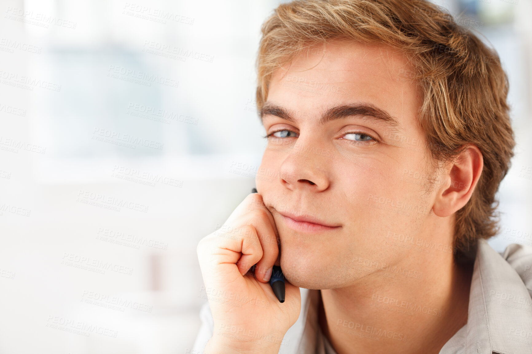 Buy stock photo Shot of a young man relaxing at home