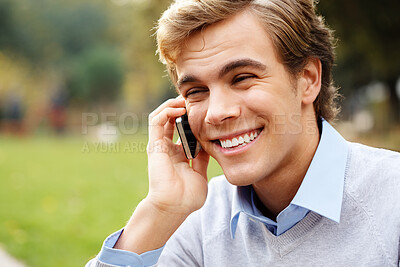 Buy stock photo Phone call, student and man with smile, park and nature to relax in university, talking and listening to contact. Communication, scholarship and technology for guy, knowledge and campus in USA