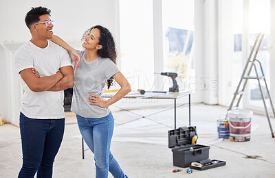 Buy stock photo Maintenance, renovation and diy with a couple in their new home together for a remodeling project. Construction, real estate or property improvement with a man and woman bonding in their house