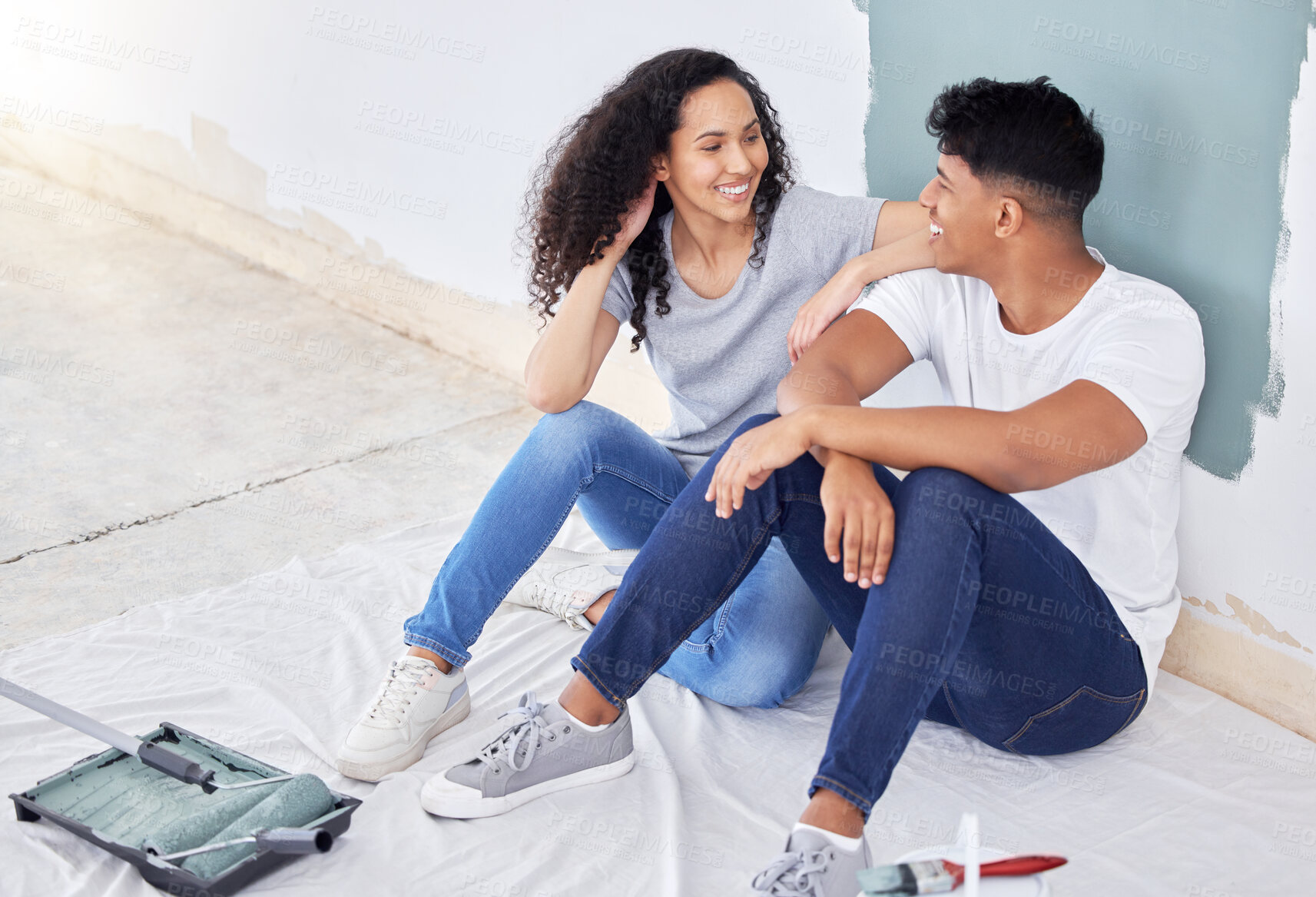 Buy stock photo Happy, couple and wall in house for painting, apartment and interior design or project for upgrade. Man, woman and together for diy home renovation, improvement and maintenance for property makeover.