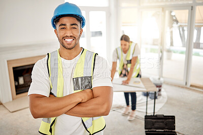 Buy stock photo Portrait of man, construction and home renovation with arms crossed, helmet and smile in apartment. Yes, positive mindset and renovations, happy handyman in safety and building project in new house.